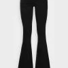 ONLY Tall ONLCORAL ANKLE SLIT - Flared Jeans - Black Denim -ONLY Tall Shop ecddc6ae005249aba4f751895d26ae7a
