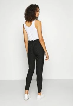 ONLY Tall ONLPOPTRASH PINSTRIPE FRILL PANT - Trousers - Black -ONLY Tall Shop eda4ff235a574ae4bf10b150ed3bc770